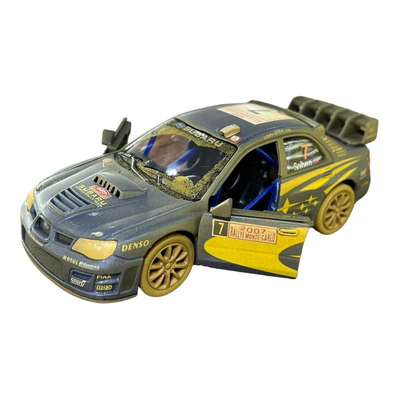 Miniatura Subaru Impreza WRC Rally Enlamado 1:36 - Kinsmart